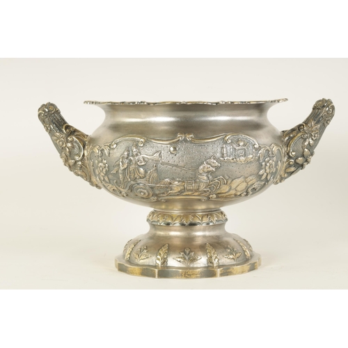 184 - A FINE 19TH CENTURY INDIAN SILVER BOWL of scalloped pedestal form with gilt interior and embossed fi... 