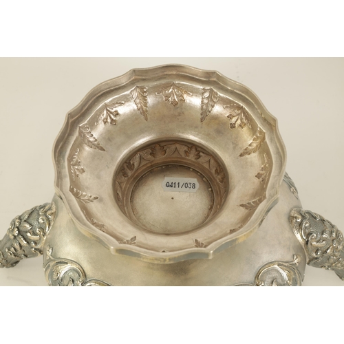 184 - A FINE 19TH CENTURY INDIAN SILVER BOWL of scalloped pedestal form with gilt interior and embossed fi... 