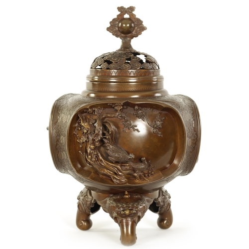 185 - A GOOD JAPANESE MEIJI PERIOD PATINATED BRONZE CENSER decorated with high relief triple panels of wat... 