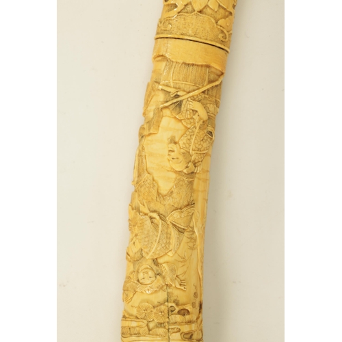 186 - A JAPANESE MEIJI PERIOD CARVED SEGMENTED IVORY SAMURAI SWORD finely carved with reliefwork scenes of... 