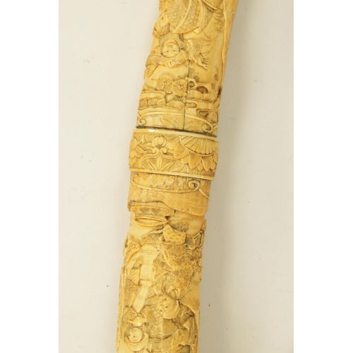 186 - A JAPANESE MEIJI PERIOD CARVED SEGMENTED IVORY SAMURAI SWORD finely carved with reliefwork scenes of... 