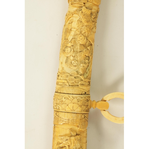 186 - A JAPANESE MEIJI PERIOD CARVED SEGMENTED IVORY SAMURAI SWORD finely carved with reliefwork scenes of... 