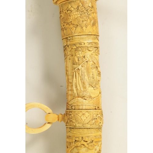 186 - A JAPANESE MEIJI PERIOD CARVED SEGMENTED IVORY SAMURAI SWORD finely carved with reliefwork scenes of... 