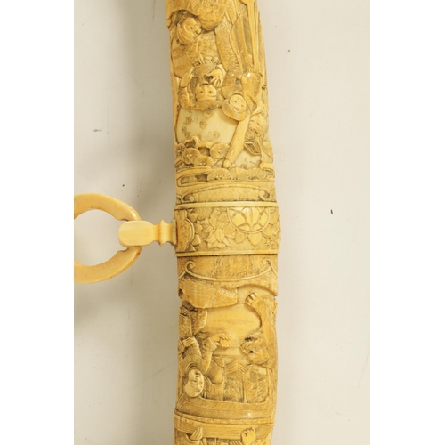 186 - A JAPANESE MEIJI PERIOD CARVED SEGMENTED IVORY SAMURAI SWORD finely carved with reliefwork scenes of... 