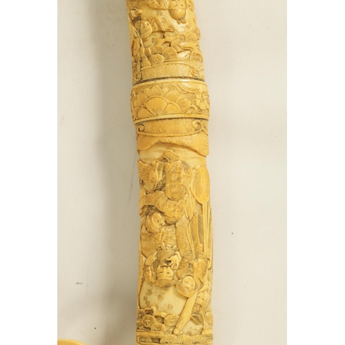 186 - A JAPANESE MEIJI PERIOD CARVED SEGMENTED IVORY SAMURAI SWORD finely carved with reliefwork scenes of... 