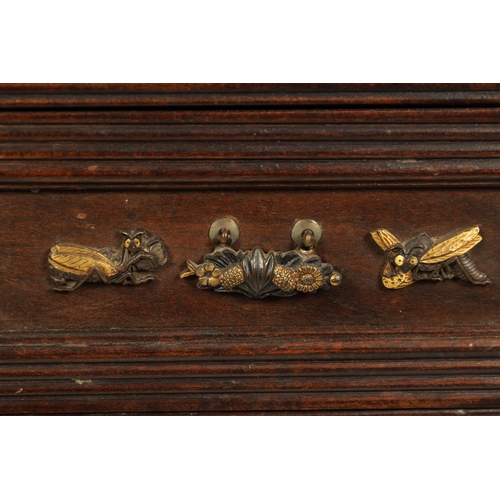 190 - A JAPANESE MEIJI PERIOD STAINED WOOD COLLECTOR'S CABINET fitted with gilt bronze menuki, comprising ... 