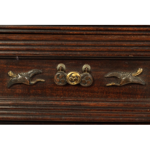 190 - A JAPANESE MEIJI PERIOD STAINED WOOD COLLECTOR'S CABINET fitted with gilt bronze menuki, comprising ... 