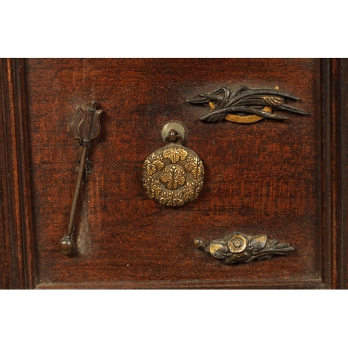 190 - A JAPANESE MEIJI PERIOD STAINED WOOD COLLECTOR'S CABINET fitted with gilt bronze menuki, comprising ... 