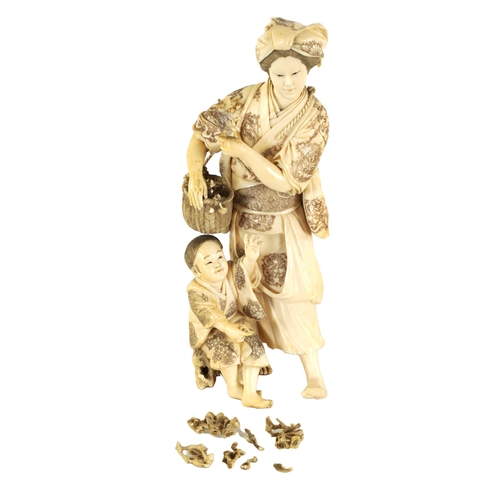 194 - A LARGE JAPANESE MEIJI PERIOD CARVED IVORY FIGURE GROUP depicting a flower seller with child - signe... 