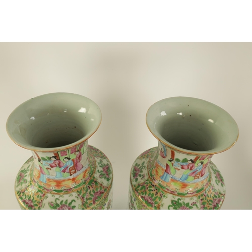 195 - A LARGE PAIR OF 19TH CENTURY CANTONESE VASES of slightly flared shouldered form decorated in the tra... 