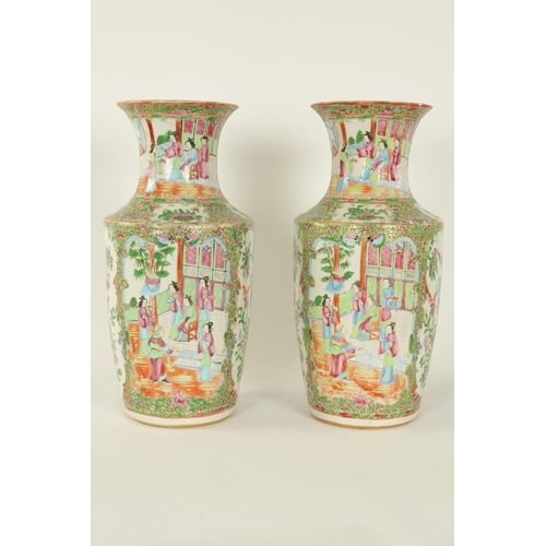 195 - A LARGE PAIR OF 19TH CENTURY CANTONESE VASES of slightly flared shouldered form decorated in the tra... 