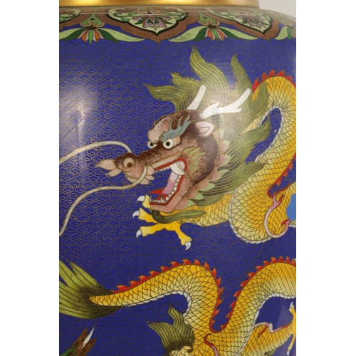 196 - A LARGE PAIR OF CHINESE CLOISONNÉ VASES having brightly coloured enamel decoration depicting dragons... 