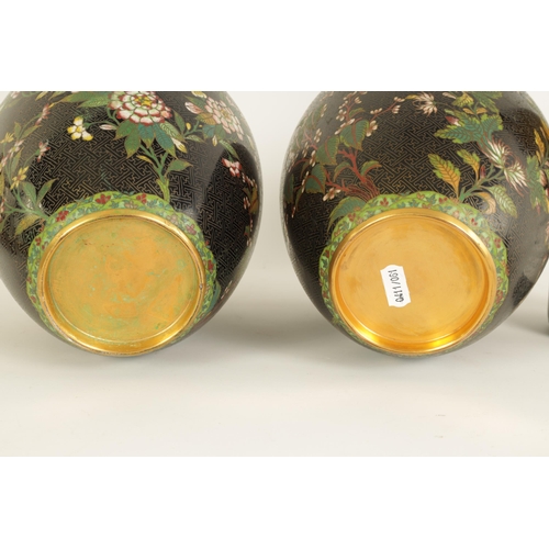 197 - A PAIR OF 19TH CENTURY CHINESE CLOISONNÉ LIDDED VASES of tapering shouldered form decorated with lea... 