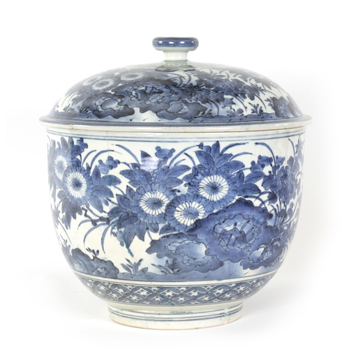 199 - AN 18TH CENTURY JAPANESE LARGE BLUE AND WHITE PORCELAIN LIDDED BOWL of rounded footed form decorated... 