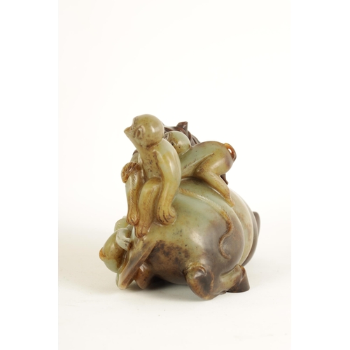 200 - AN EARLY CHINESE CARVED RUSSET JADE SCULPTURE OF A RECUMBENT HORSE AND THREE MONKEYS finely carved a... 