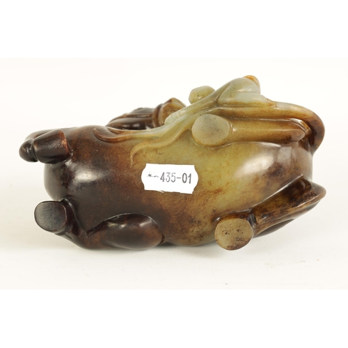 200 - AN EARLY CHINESE CARVED RUSSET JADE SCULPTURE OF A RECUMBENT HORSE AND THREE MONKEYS finely carved a... 