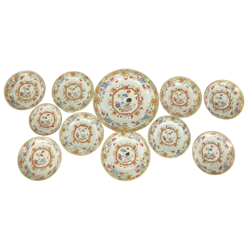 201 - A SELECTION OF ELEVEN 18TH CENTURY FAMILLE ROSE CHINESE PORCELAIN PLATES decorated in brightly colou... 