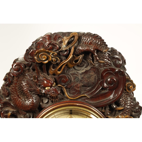 202 - A MEIJI PERIOD JAPANESE HARDWOOD, IVORY AND LACQUERWORK TABLE CLOCK the finely carved case decorated... 