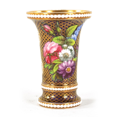 23 - AN EARLY 19TH CENTURY SPODE TYPE SPILL VASE of bead-edged flared footed form finely painted with flo... 