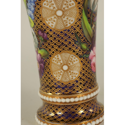 23 - AN EARLY 19TH CENTURY SPODE TYPE SPILL VASE of bead-edged flared footed form finely painted with flo... 