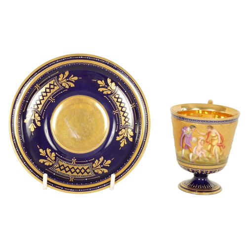 24 - A FINE LATE 19TH CENTURY VIENNA STYLE RICHLY GILT AND ROYAL BLUE CABINET CUP AND SAUCER the pedestal... 