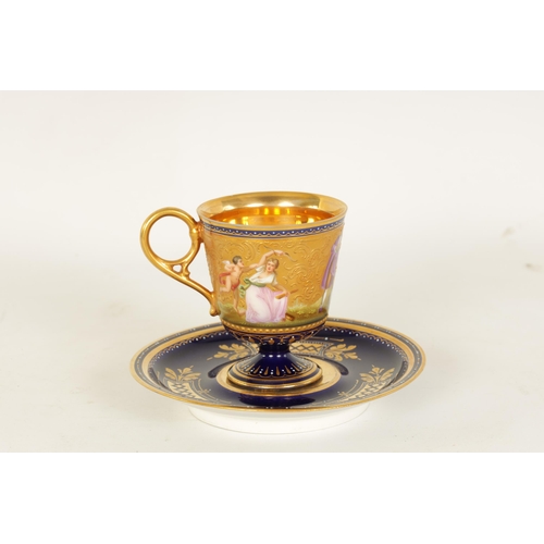 24 - A FINE LATE 19TH CENTURY VIENNA STYLE RICHLY GILT AND ROYAL BLUE CABINET CUP AND SAUCER the pedestal... 