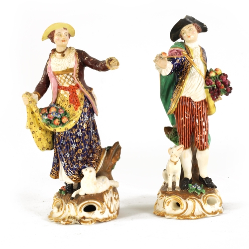 25 - A PAIR OF 18TH CENTURY DERBY PORCELAIN FLOWER SELLER FIGURES well modelled and dressed in detailed b... 