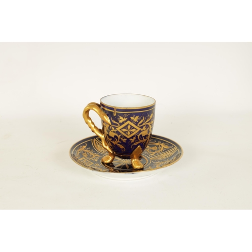 28 - A LATE 19TH CENTURY VIENNA STYLE RICHLY GILT AND ROYAL BLUE CABINET CUP AND SAUCER the ovoid cup wit... 