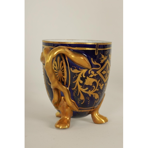 28 - A LATE 19TH CENTURY VIENNA STYLE RICHLY GILT AND ROYAL BLUE CABINET CUP AND SAUCER the ovoid cup wit... 