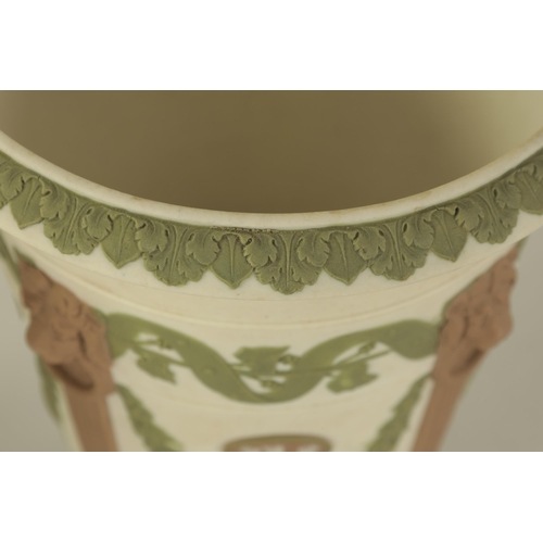 29 - AN UNUSUAL NEAR PAIR OF 19TH CENTURY WEDGWOOD JASPERWARE FLARED FOOTED VASES pale green ground with ... 