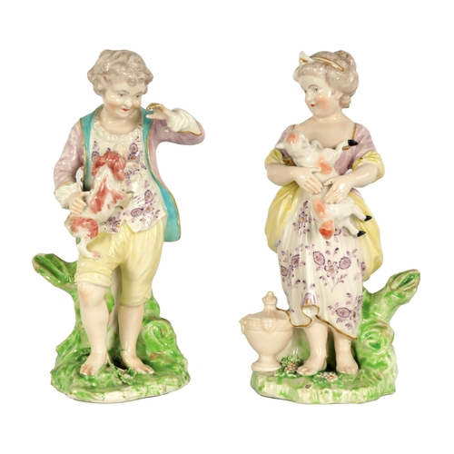 34 - A PAIR OF 18TH CENTURY DERBY SHEPHERD BOY AND SHEPHERDESS FIGURES well modelled and decorated in pas... 