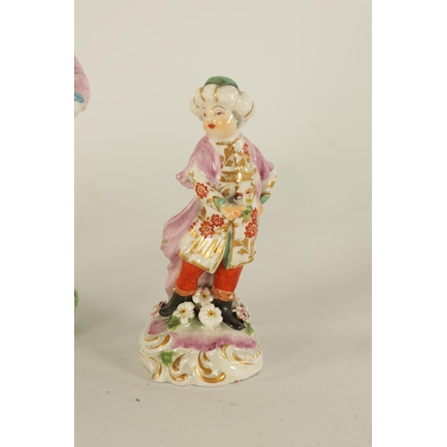 44 - TWO 18TH CENTURY SMALL DERBY POLYCHROME FIGURES OF AN OYSTER VENDOR AND A FLOWER SELLER together wit... 