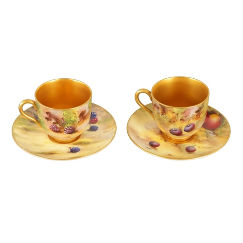 45 - TWO ROYAL WORCESTER FRUIT CABINET CUPS AND SAUCERS each richly gilt and painted with ripe fruits on ... 