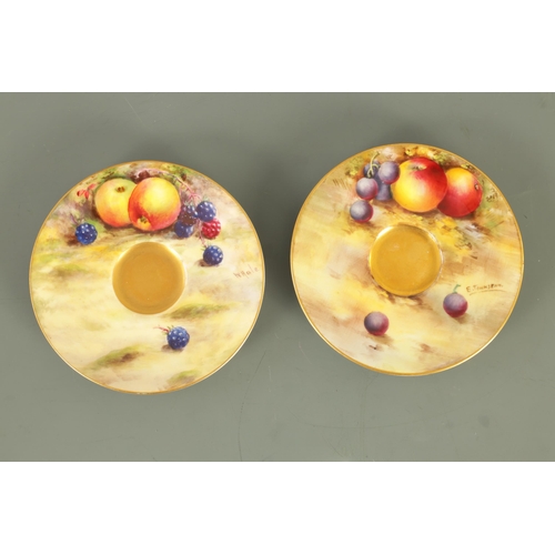 45 - TWO ROYAL WORCESTER FRUIT CABINET CUPS AND SAUCERS each richly gilt and painted with ripe fruits on ... 