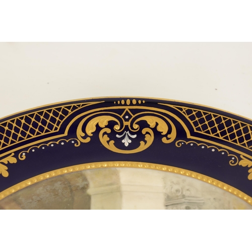 50 - A PAIR OF LATE 19TH CENTURY VIENNA TYPE CABINET PLATES each with trellised gilt royal blue border en... 