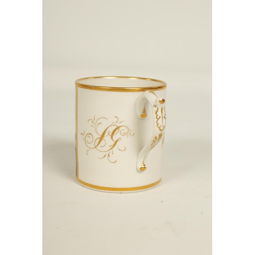 54 - AN EARLY 19TH CENTURY FLIGHT BARR AND BARR WORCESTER MUG the gilt edged body enclosing a sepia monoc... 