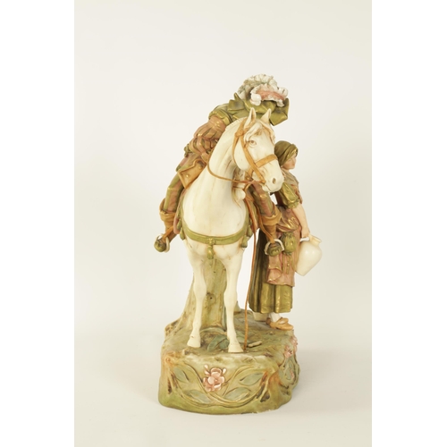 56 - A LATE 19TH CENTURY ROYAL DUX, BOHEMIA HORSE AND FIGURE GROUP finely modelled standing with a mounte... 