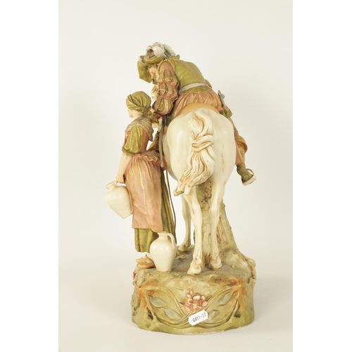 56 - A LATE 19TH CENTURY ROYAL DUX, BOHEMIA HORSE AND FIGURE GROUP finely modelled standing with a mounte... 