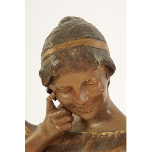 57 - FRIEDRICH GOLDSCHEIDER, WIEN. A LATE 19TH CENTURY PAINTED TERRACOTTA SCULPTURE depiciting a standing... 