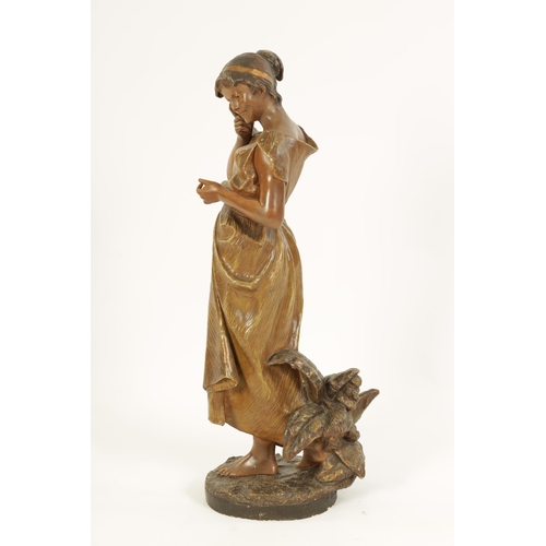 57 - FRIEDRICH GOLDSCHEIDER, WIEN. A LATE 19TH CENTURY PAINTED TERRACOTTA SCULPTURE depiciting a standing... 