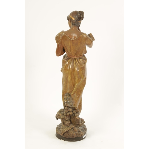 57 - FRIEDRICH GOLDSCHEIDER, WIEN. A LATE 19TH CENTURY PAINTED TERRACOTTA SCULPTURE depiciting a standing... 