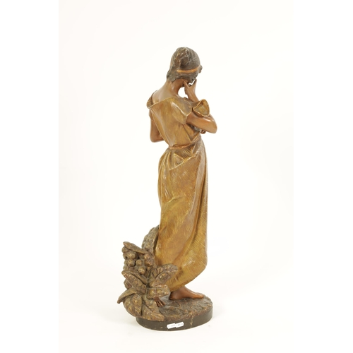 57 - FRIEDRICH GOLDSCHEIDER, WIEN. A LATE 19TH CENTURY PAINTED TERRACOTTA SCULPTURE depiciting a standing... 