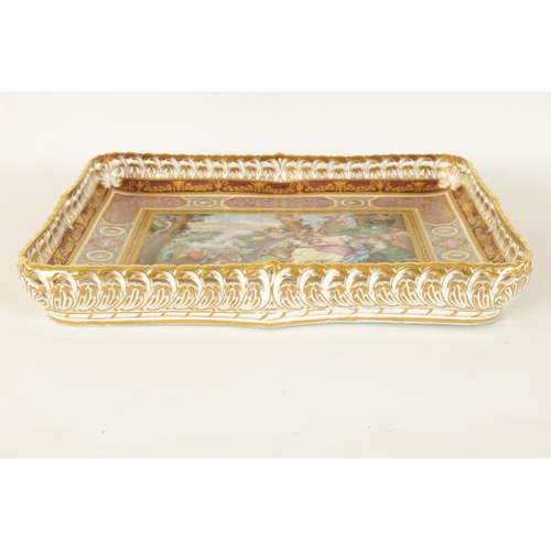 59 - A FINE 19TH CENTURY VIENNA PORCELAIN RECTANGULAR TRAY the gilt-edged raised shaped pierced gallery e... 