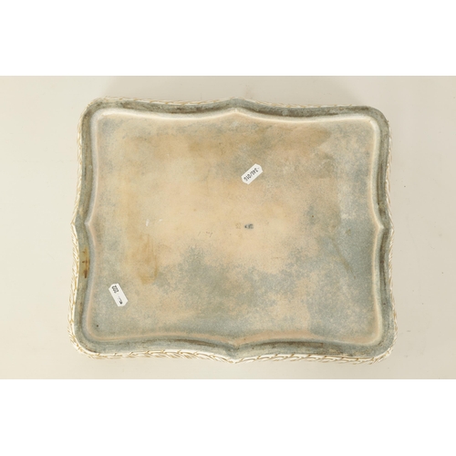 59 - A FINE 19TH CENTURY VIENNA PORCELAIN RECTANGULAR TRAY the gilt-edged raised shaped pierced gallery e... 