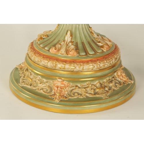 62 - A FINE ROYAL WORCESTER BLUSHED IVORY PEDESTAL VASE AND COVER of exceptional shape and design with re... 