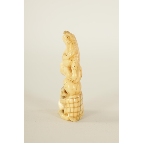 64 - A JAPANESE MEIJI PERIOD CARVED IVORY NETSUKE depicting a frog sat on a skeleton (A.F.). (6.5cm high ... 