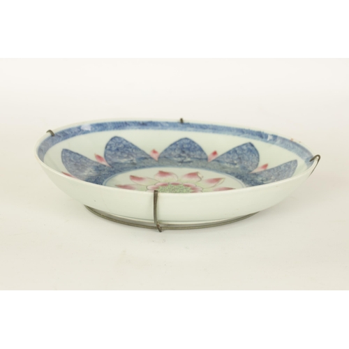 72 - AN 18TH CENTURY CHINESE FAMILLE ROSE PORCELAIN DISH finely decorated in brightly coloured enamels wi... 