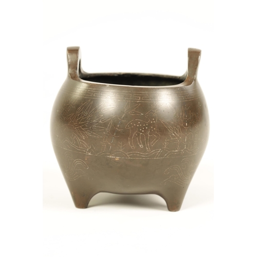 73 - AN 18TH/19TH CENTURY CHINESE BRONZE CENSER WITH SILVER WIRE INLAY of bulbous form with loop handles ... 