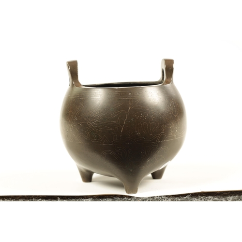 73 - AN 18TH/19TH CENTURY CHINESE BRONZE CENSER WITH SILVER WIRE INLAY of bulbous form with loop handles ... 