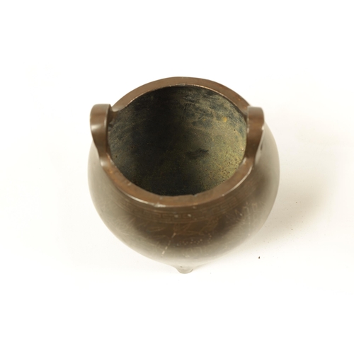 73 - AN 18TH/19TH CENTURY CHINESE BRONZE CENSER WITH SILVER WIRE INLAY of bulbous form with loop handles ... 